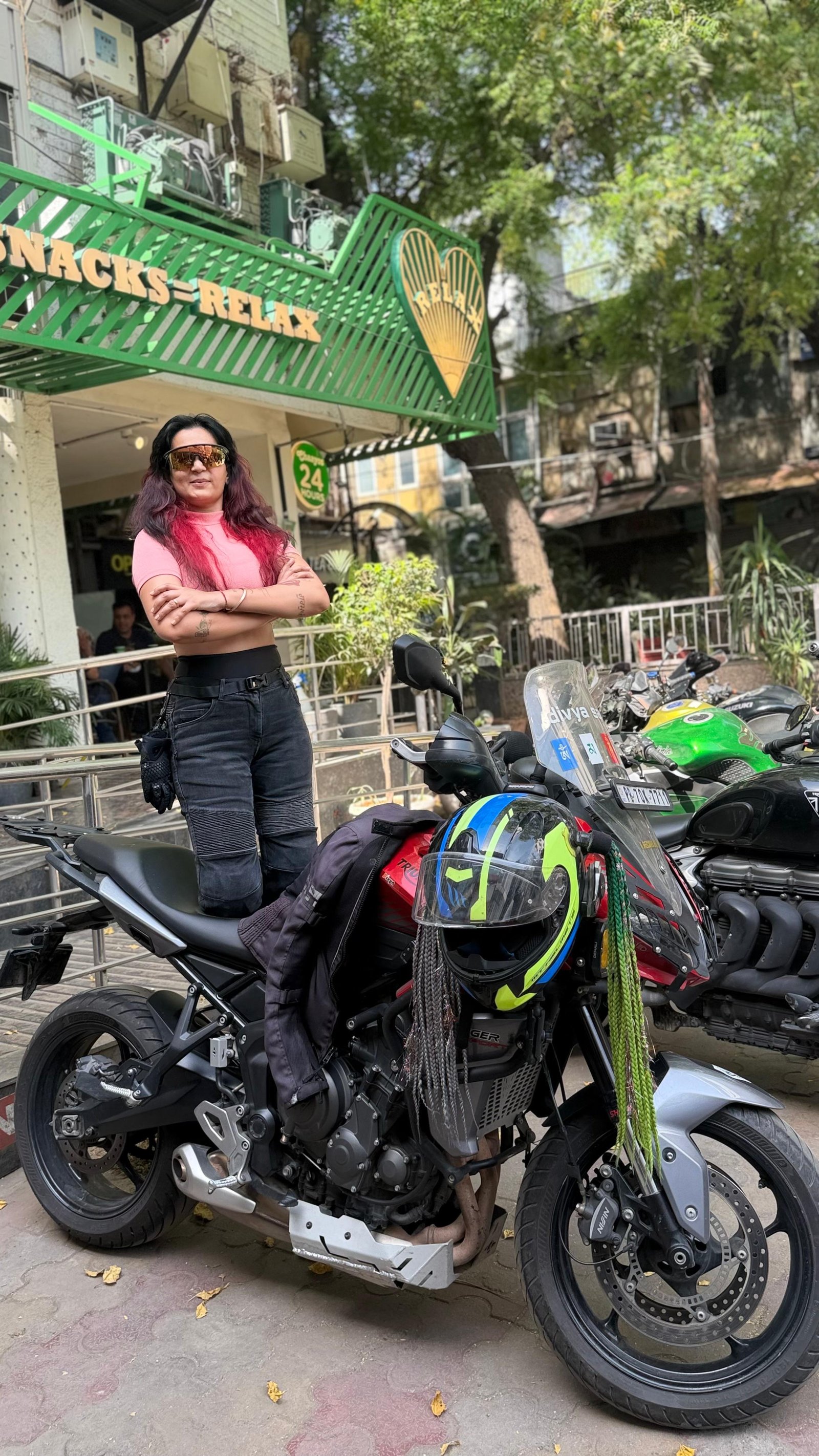 Divya Sandhu with her motorcycle